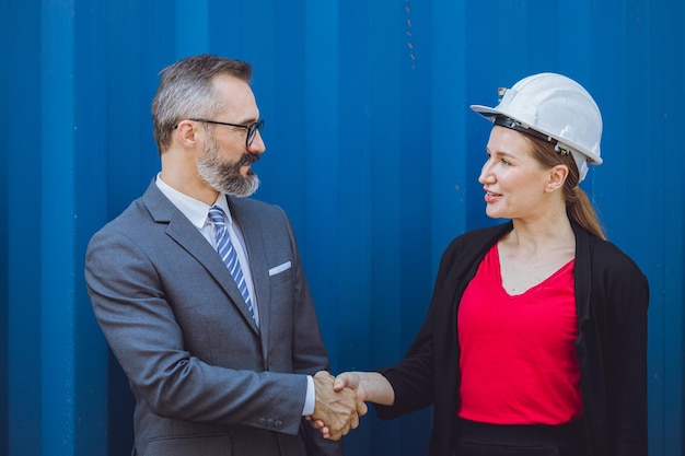 professional businessman investor handshake deal project with working woman engineer industry 43300 3148